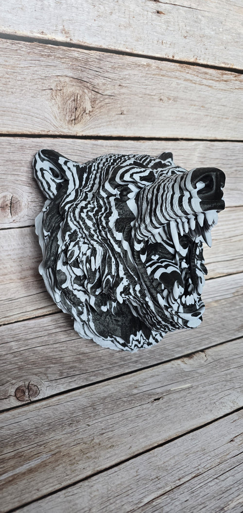 Three-quarter view of black-and-white roaring grizzly bear head wall art with layered fur, exposed teeth and an open mouth.