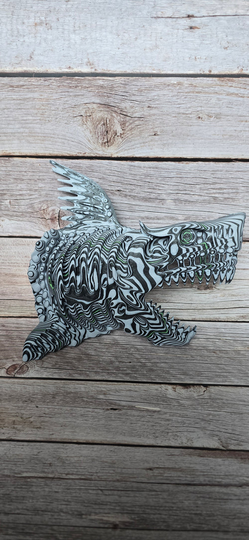 Full view of black-and-white fantasy shark wall art with open jaws, pointed teeth, sweeping fins and green eye accents.